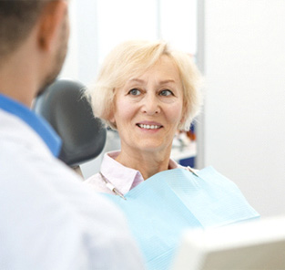 woman getting dental checkup in Norton Shores
