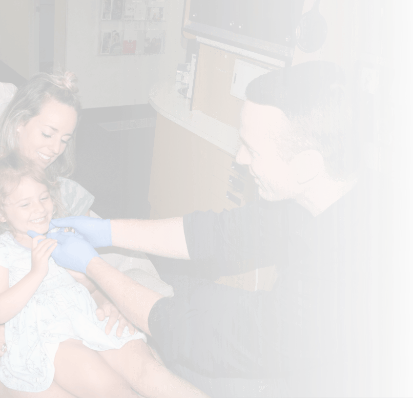 Norton Shores dentist treating young girl